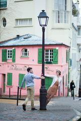 Beautiful romantic couple on Montmartre in Paris