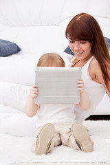 Mother and daughter using a tablet pc