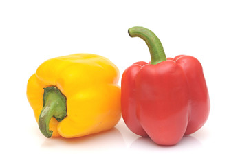 fresh yellow and red bell peppers isolated on white