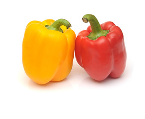fresh yellow and red bell peppers isolated on white