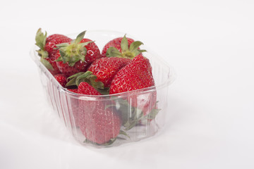 Strawberries in plastic packaging