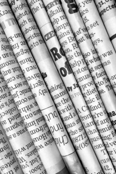 Row of Newspapers in Black and White