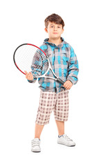 Full length portrait of a child holding a tennis racket