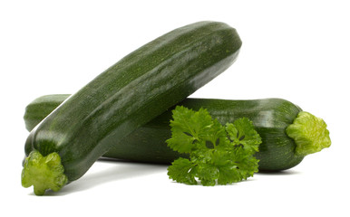 Two fresh vegetable zucchini isolated on white background