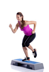 Woman doing step exercise
