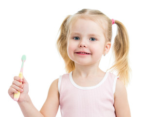 cute child girl brushing teeth isolated on white background