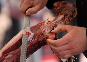 Cutting spanish ham - Jamon Serrano. Andalusia, Spain