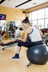 Young woman training in the gym