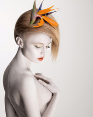 Bodypainting. Dreamy Woman with Flower. Futurism. Silver Skin