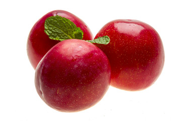 Bright ripe plum with mint