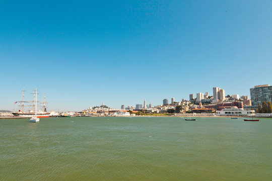 Skyline of San Francisco with blue sky.