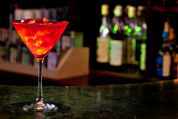 cosmopolitan cocktail on the background of the bar