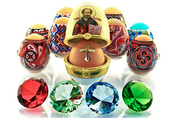 Easter eggs and jewelry isolated on a white background.