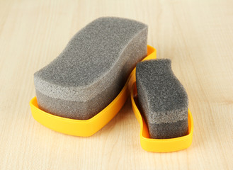 Shoe shine sponges, on wooden background