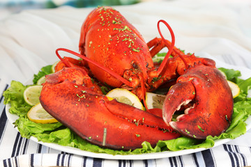 Red lobster on platter on serving table close-up