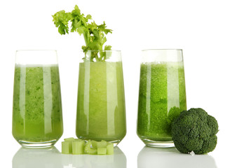 Glasses of green vegetable juice, isolated on white