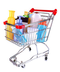 Cosmetics in cart isolated on white