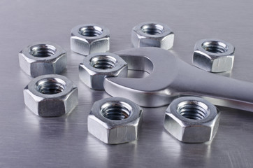 Metal nut and wrench