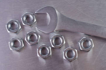Metal nut and wrench