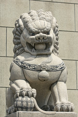 Statue of lion tread on the earth