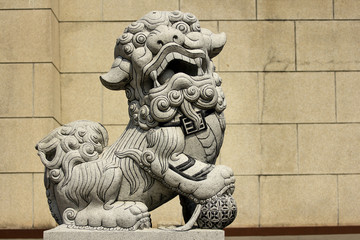 Statue of lion tread on the earth