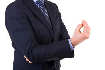 Businessman gesturing with hand.