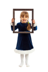 Little girl looking trough wooden frame