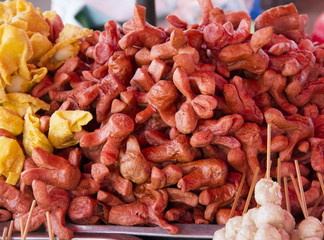 Heap of sausages on sale in the market.