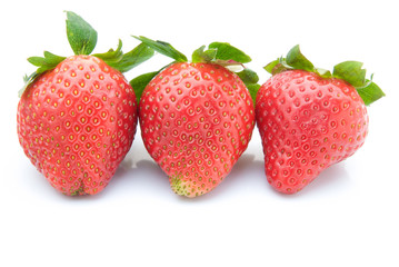 three pieces of strawberries on white background