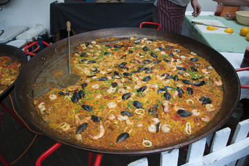 Large pan of Paella cooking