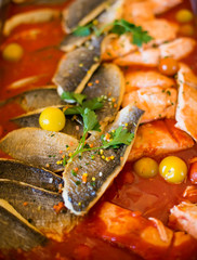 Fototapeta na wymiar Grilled salmon and dorado fish with vegetables