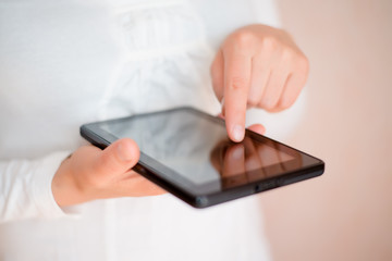 woman using the digital tablet