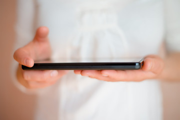 woman using the digital tablet