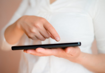 woman using the digital tablet