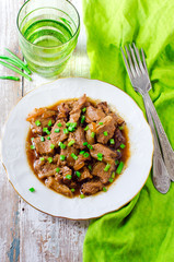 .Beef stewed in beer with onions