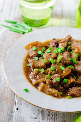 .Beef stewed in beer with onions