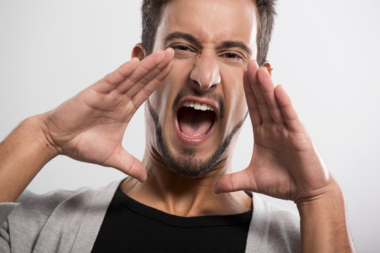 Young man shouting