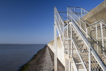 Steps over the sea wall on Canvey Island, Essex, England