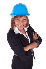 Confident Black African American woman architect smiling with fo
