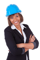 Confident Black African American woman architect smiling with fo