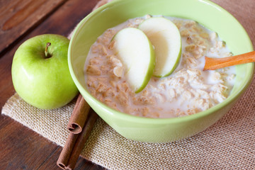 Bowl of oatmeal with apples