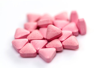 Obraz na płótnie Canvas pile of medicinal pink pills