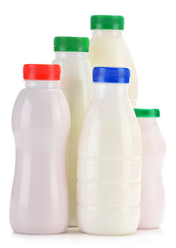 Composition with plastic bottles of milk products