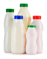 Composition with plastic bottles of milk products