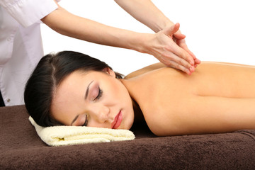 Fototapeta na wymiar Beautiful young woman in spa salon getting massage, isolated