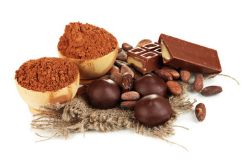 Composition of chocolate sweets and cocoa, isolated on white