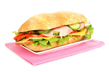 Fresh and tasty sandwich with ham and vegetables isolated