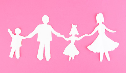 Paper people on color background