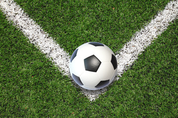 Fototapeta na wymiar Soccer football field stadium grass line ball background texture