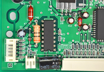 Close up of a printed green computer circuit board
